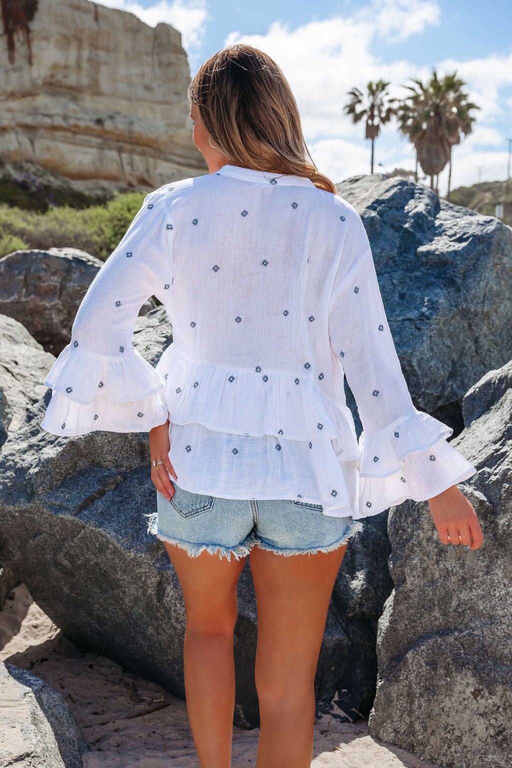 Ivory Ruffle Embroidery Peplum Top